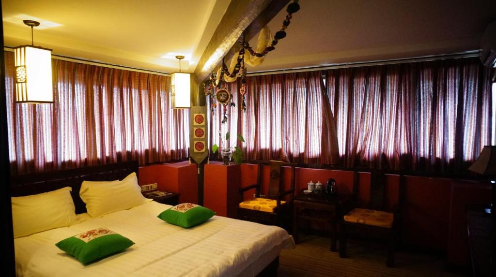 Lijiang Wangjia Courtyard Inn Rum bild