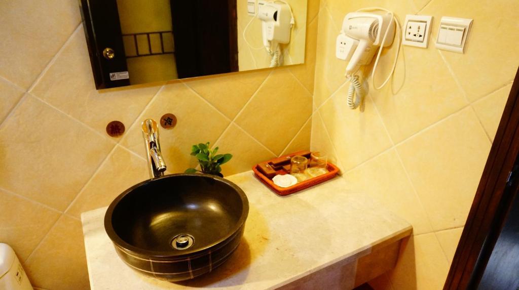 Lijiang Wangjia Courtyard Inn Rum bild